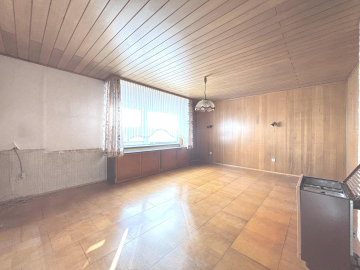 Wohnzimmer - Kompaktes Einfamilienhaus in Giesen!