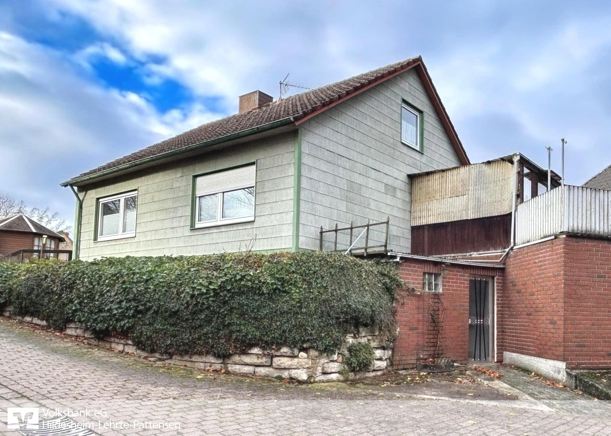 Außenansicht Haus - Kompaktes Einfamilienhaus in Giesen!