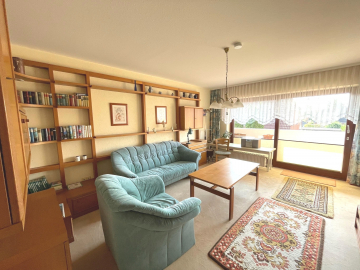 Wohnzimmer - Charmante 3-Zimmer-Wohnung mit Balkon und Stellplatz in ruhiger Lage von Hannover-Anderten